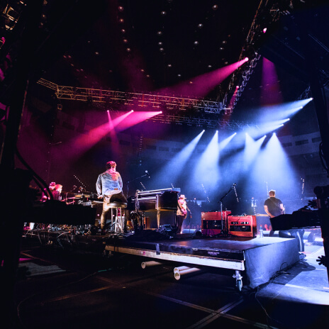 Live performance with dramatic stage lighting